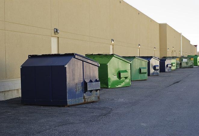 large construction waste containers in a row at a job site in Bellevue, WI